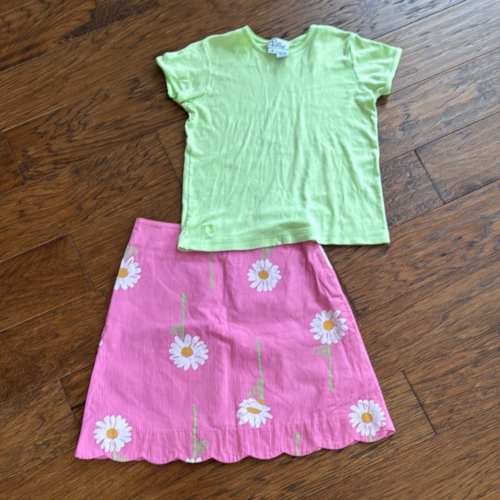 Vintage Lilly Pulitzer scalloped hem pink skirts and green matching top.